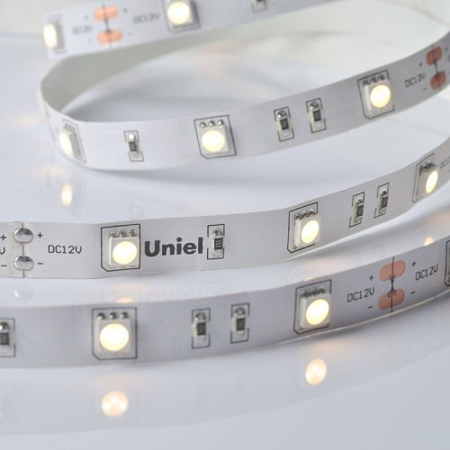 Светодиодная лента Uniel ULS-M25 ULS-M22-5050-30LED/m-10mm-IP20-DC12V-7,2W/m-5M-3000K PROFI катушка в герметичной упаковке