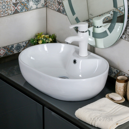 Раковина из сантехнического фарфора Melana 7734-805 63х41 накладная цвет белый 1 отверстие под смеситель