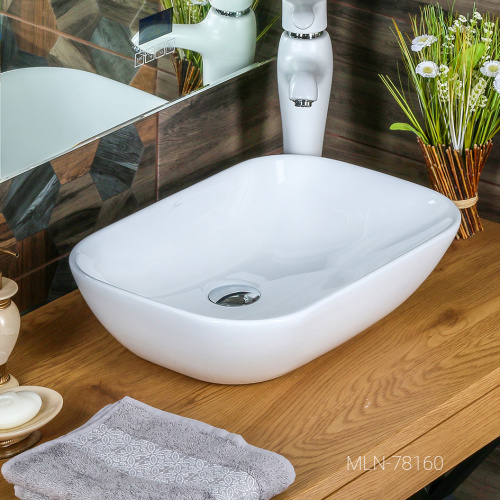 Раковина из сантехнического фарфора Melana 78160-805 51х34 накладная цвет белый без отверстий под смеситель