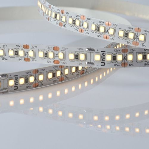 Светодиодная лента Uniel ULS-M16-2835 ULS-M16-2835-180LED/m-10mm-IP20-DC12V-17W/m-5M-3000K PROFI катушка в герметичной упаковке