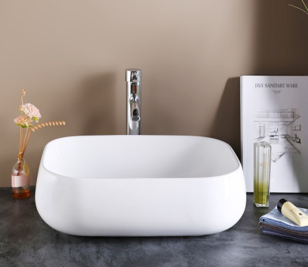 Раковина из санфаянса CeramaLux 9243 58х43 накладная цвет белый