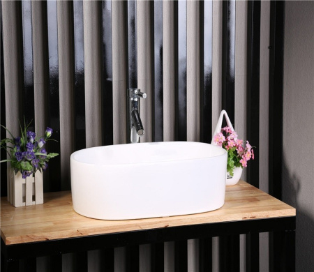 Раковина из санфаянса CeramaLux 9025-1 57х35 накладная цвет белый