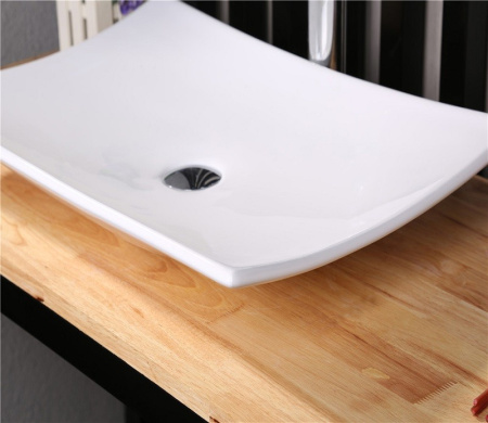 Раковина из санфаянса CeramaLux 78123B 68х35 накладная цвет белый