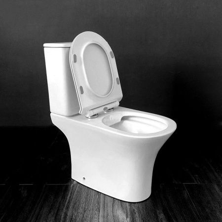 Унитаз напольный с бачком CeramaLux 1217A белый с сиденьем микролифт безободковый