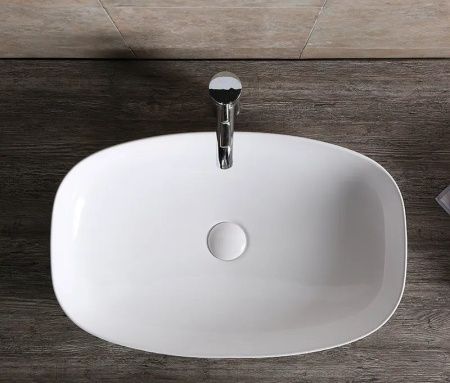 Раковина из сантехнического фарфора Cerutti SPA CR0063 60х40 накладная цвет белый без отверстий под смеситель