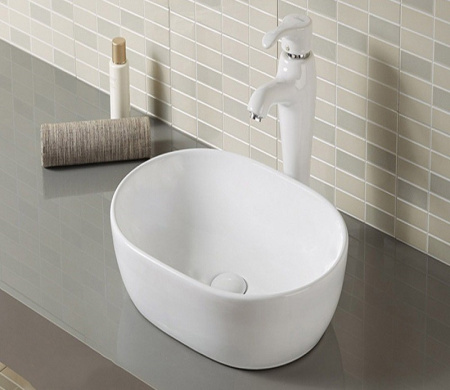 Раковина из санфаянса CeramaLux 9026B 48х35 накладная цвет белый