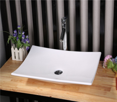 Раковина из санфаянса CeramaLux 78123A 60х39 накладная цвет белый