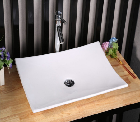 Раковина из санфаянса CeramaLux 78123B 68х35 накладная цвет белый