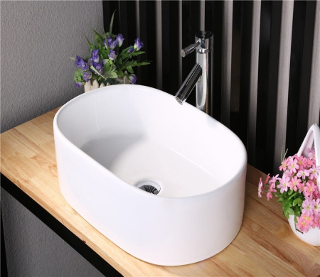 Раковина из санфаянса CeramaLux 9025-1 57х35 накладная цвет белый