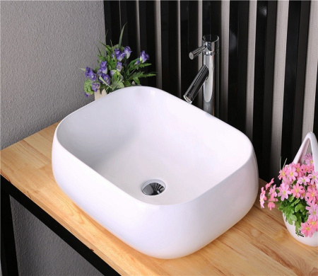 Раковина из санфаянса CeramaLux 9243 58х43 накладная цвет белый