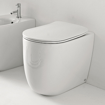 Чаша унитаза приставная Kerasan Nolita 531801 цвет белый глянцевый без сиденья безободковая каскадный смыв