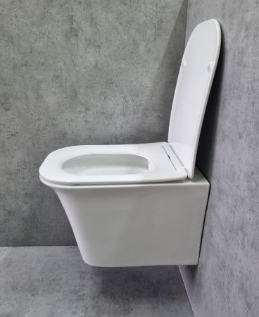 Унитаз подвесной CeramaLux 2622E белый с сиденьем микролифт каскадный смыв