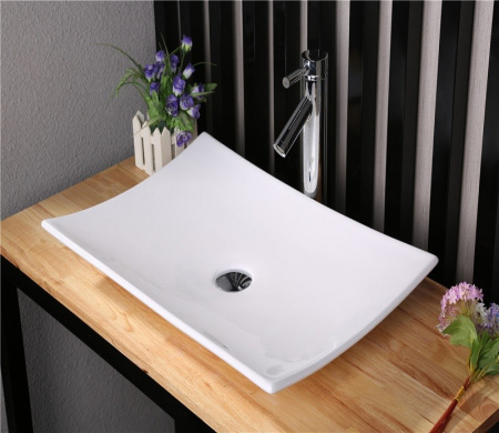 Раковина из санфаянса CeramaLux 78123B 68х35 накладная цвет белый