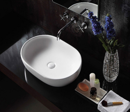 Раковина из санфаянса CeramaLux 9026A 60х42 накладная цвет белый