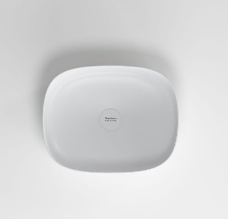 Раковина из искусственного камня Plumberia Selection Veloma VELOMA OVAL BN 50х40 накладная цвет белый/черный