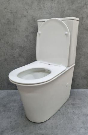 Унитаз напольный с бачком CeramaLux 1222A белый с сиденьем микролифт безободковый каскадный смыв