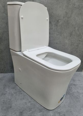 Унитаз напольный с бачком CeramaLux 1218A белый с сиденьем микролифт безободковый каскадный смыв