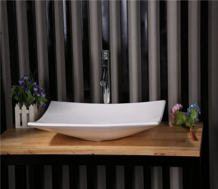 Раковина из санфаянса CeramaLux 78123B 68х35 накладная цвет белый