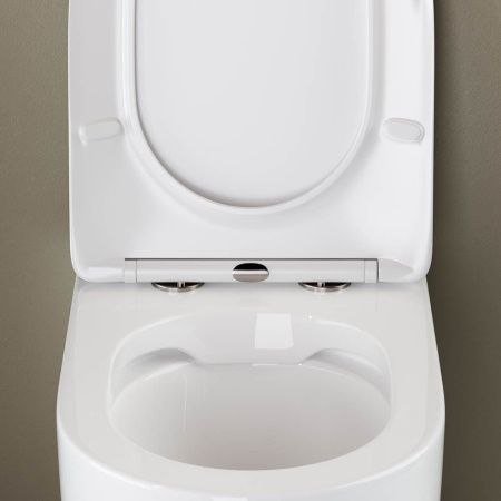 Унитаз приставной Ceramica Nova MIA CN1810 белый с сиденьем микролифт безободковый душевой смыв