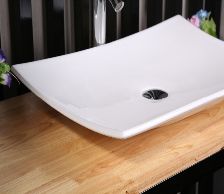 Раковина из санфаянса CeramaLux 78123B 68х35 накладная цвет белый