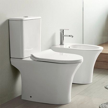 Унитаз напольный с бачком CeramaLux 1217A белый с сиденьем микролифт безободковый