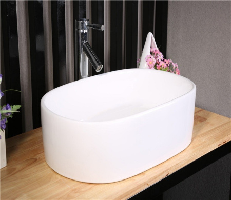 Раковина из санфаянса CeramaLux 9025-1 57х35 накладная цвет белый