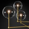 Люстра на штанге Delight Collection Globe Mobile (Глобе Мобиле) KG0835P-3 brass