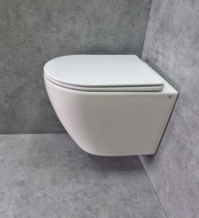 Унитаз подвесной CeramaLux TR2196 белый с сиденьем микролифт смыв торнадо